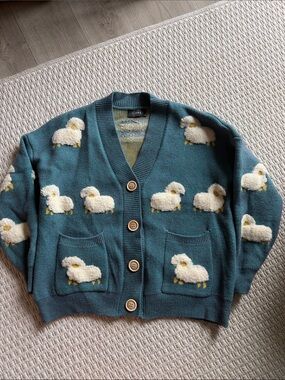 Teal sheep patterned button-cardigan